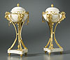 A very fine pair of Louis XVI gilt bronze and white marble dishes with cover